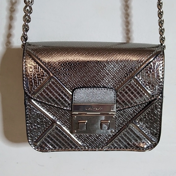Calvin Klein Handbags - CALVIN KLEIN Saffiano Mini Crossbody with push lock closure